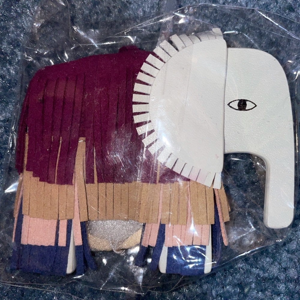Ivory ella mauvewood tasseled elephant keychain